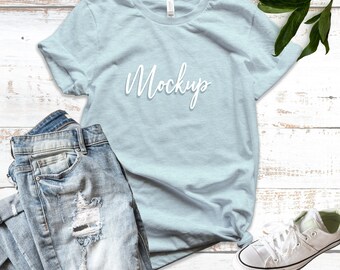 Download Bella And Canvas 3001 Mockup Heather Prism Ice Blue Leaves And Ripped Jeans Unisex T Shirt Mockup Flat Lay Product Mockup Mockup Templates The Best Free Premium Mockups