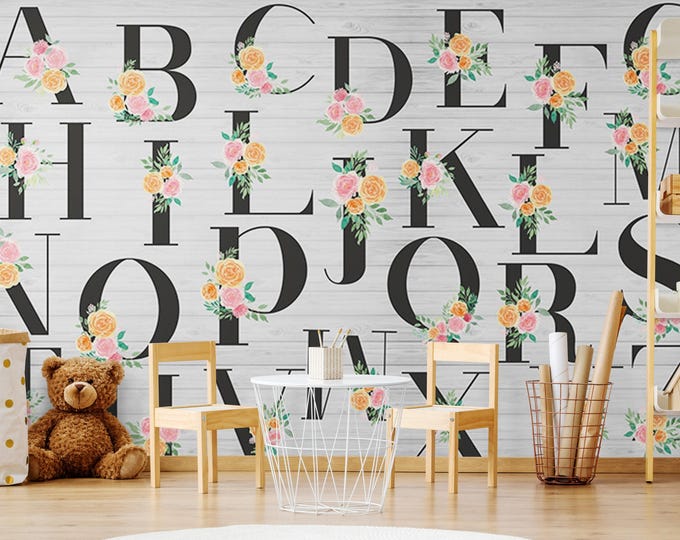 Floral Alphabet Wallpaper Mural – Pink and Yellow Rose Letters on White Wood Background – Educational Wall Art for Nursery or Classroom