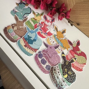 Adesivi macarons EEVEELUTIONS (evoluzione di Eevee) di PKMN olografici / lucidi