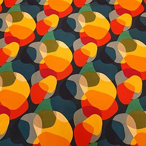 May include: A fabric design with an abstract pattern of overlapping organic shapes in yellow, orange, red, green, grey, and blue. The design has a modern, artistic feel, suitable for various textile applications.