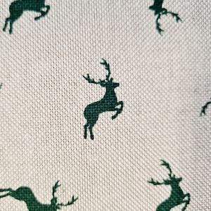 Fabric by the meter cotton easy-care natural &quot;Jumping Deer&quot; fir green hunting 0.5 m