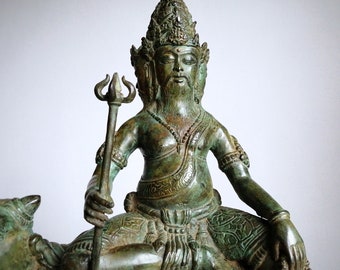Trimurti statue (sitting on a bull)