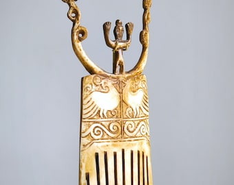 Vintage tribal carved bone comb, Maluku islands