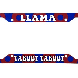 May include: A blue and red license plate frame with white text that reads "LLAMA TABOOT TABOOT".