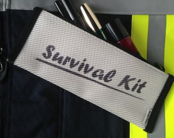 Cosmetic / toiletry bag imprint "Survival Kit"