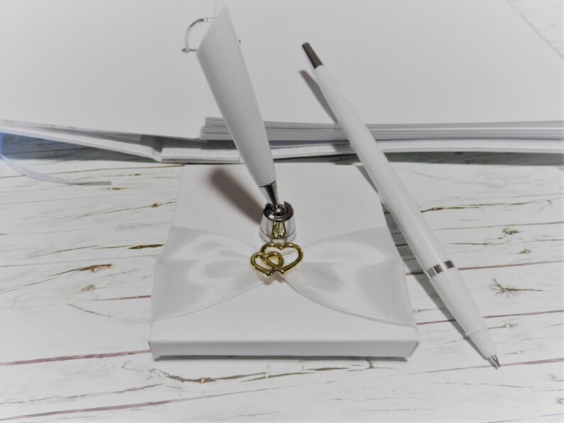 Wedding guest book with pen and holder in white and gold image 2