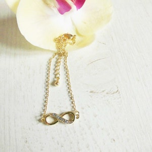 Pulsera de boda infinito en oro o plata con piedras circonitas más embalaje y tarjeta de regalo.