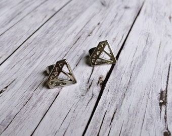 Silver stud earrings in diamond shape
