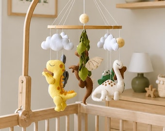 Karuzela dla niemowląt z dinozaurami. Dekoracja do pokoju dziecięcego w stylu jurajskim. Upominek na baby shower z dinozaurami. Prezent dla noworodka.