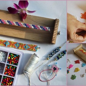 May include: A close-up of a loom with colorful beads strung on it. There are several finished bracelets and a container of beads in the image. The loom is made of wood and has a white string running through it. The beads are various colors, including red, blue, green, yellow, and orange.
