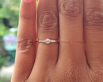 Petite Moissanite Three-Stone Ring: 0.33CT Round & Baguette, 10K Yellow Gold