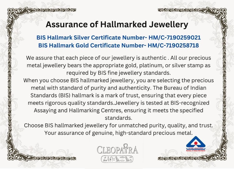 May include: A certificate with ornate borders, assuring the authenticity of hallmarked jewelry. Text includes BIS Hallmark Silver and Gold Certificate numbers, and details about purity and standards.
