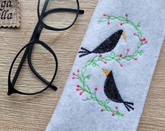 Glasses case with a pair of blackbirds