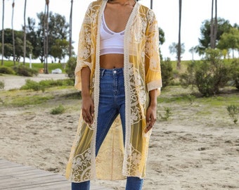 yellow duster sweater