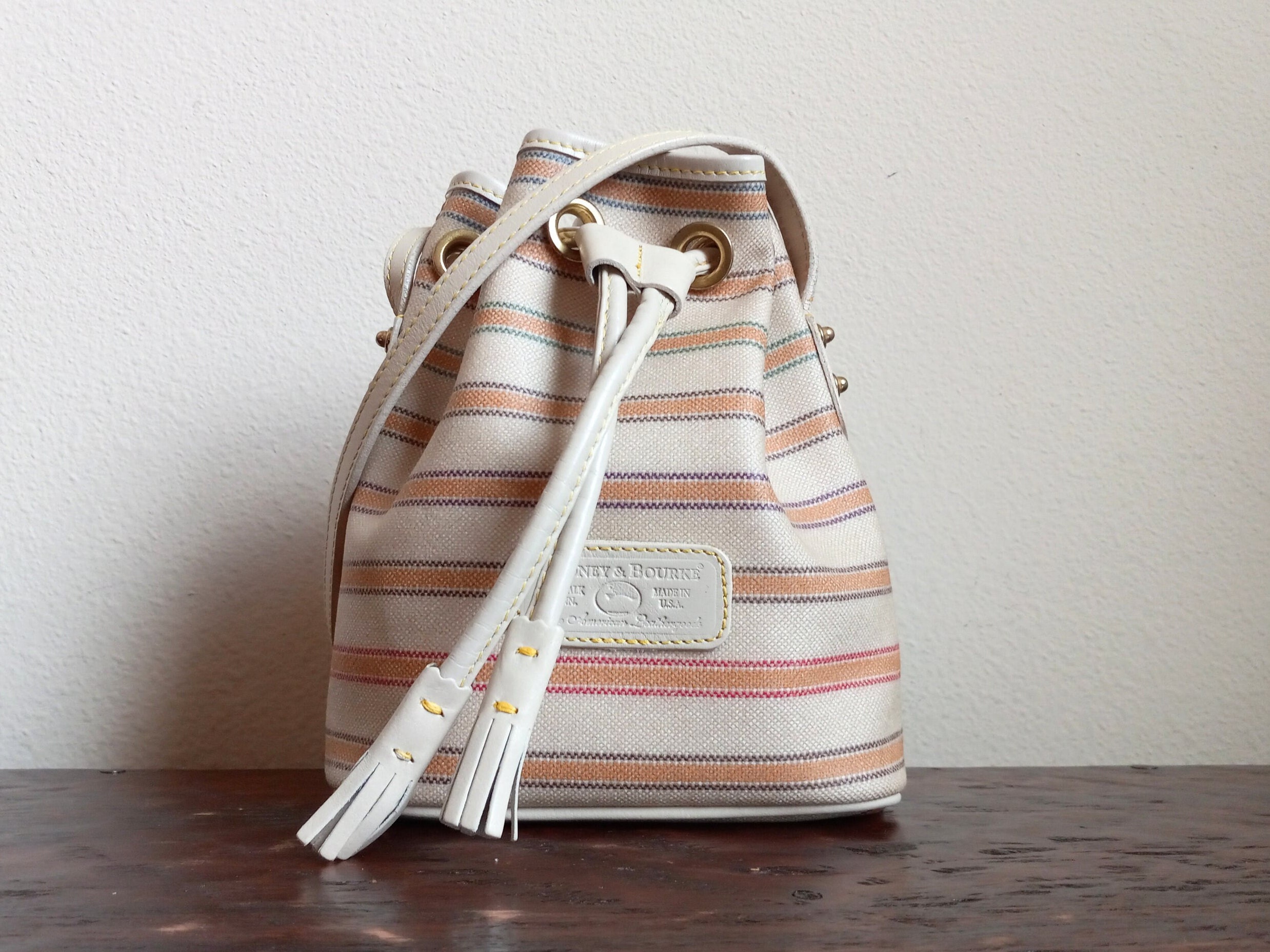 VINTAGE Dooney & Bourke Drawstring Canvas Signature DB Bucket Leather -  beyond exchange