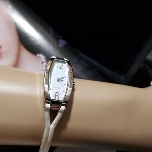 European Design Watch  Quartz Watch Silver Tone and White Leather Band  Working Great Condition For Women