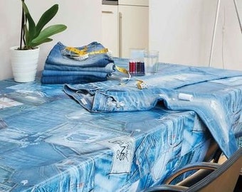 Toile cirée dans le décor de jeans bleu (vendue au mètre)