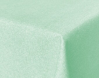 Coated cotton plain mint mottled (sold by the metre)