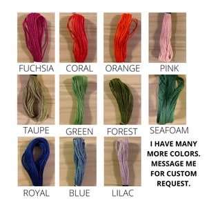 May include: A selection of embroidery floss spools in various colors, including fuchsia, coral, orange, pink, taupe, green, forest, seafoam, royal blue, blue, and lilac. The text "I have many more colors. Message me for custom request." is written below the spools.