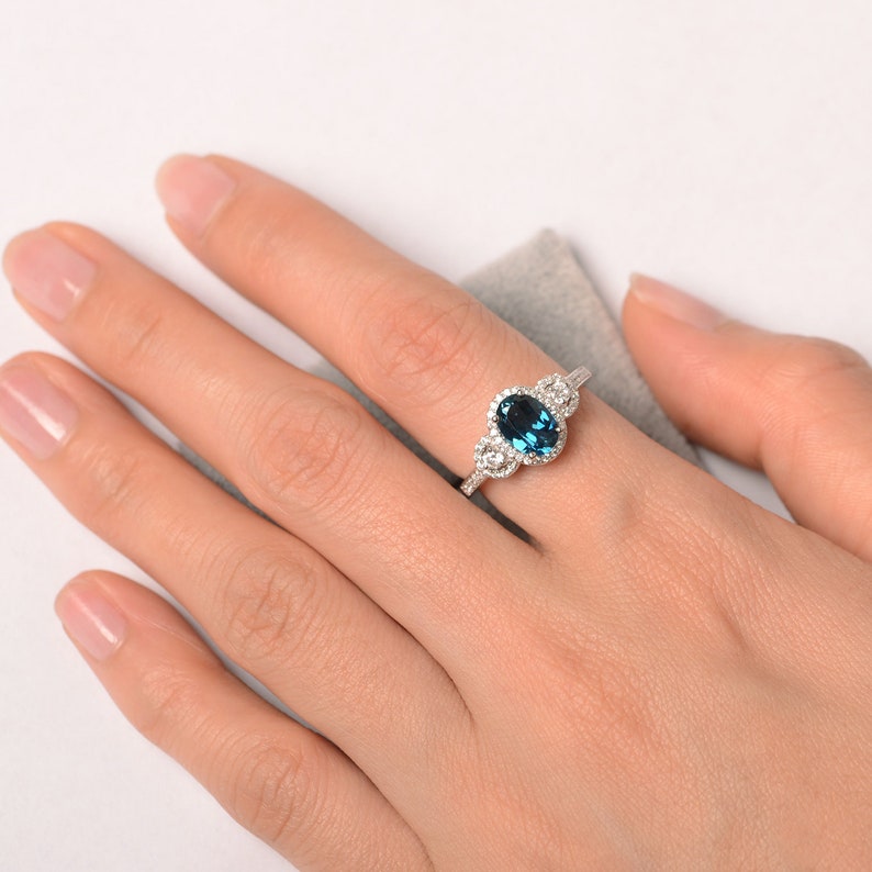 London blue topaz ring oval cut halo engagement ring