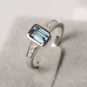 London blue topaz white gold engagement ring bezel setting ring emerald cut blue gemstone