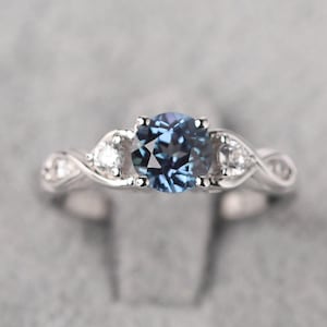 Twisted shank alexandrite engagement ring silver round cut June birthstone ring