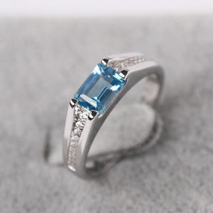 Echte Schweizer Blautopas-Verlobungsring Smaragdschliff 14K Weißgold November Birthstone Ring