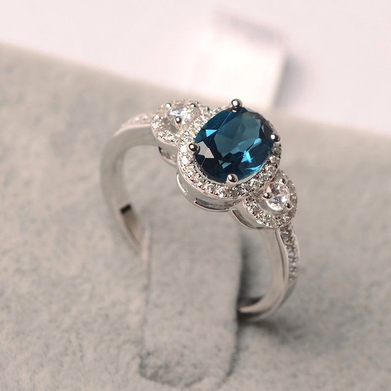London blue topaz ring oval cut halo engagement ring