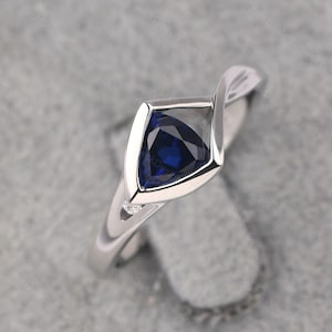 Minimalist infinity sapphire ring trillion cut 0.95 carat anniversary ring September birthstone ring
