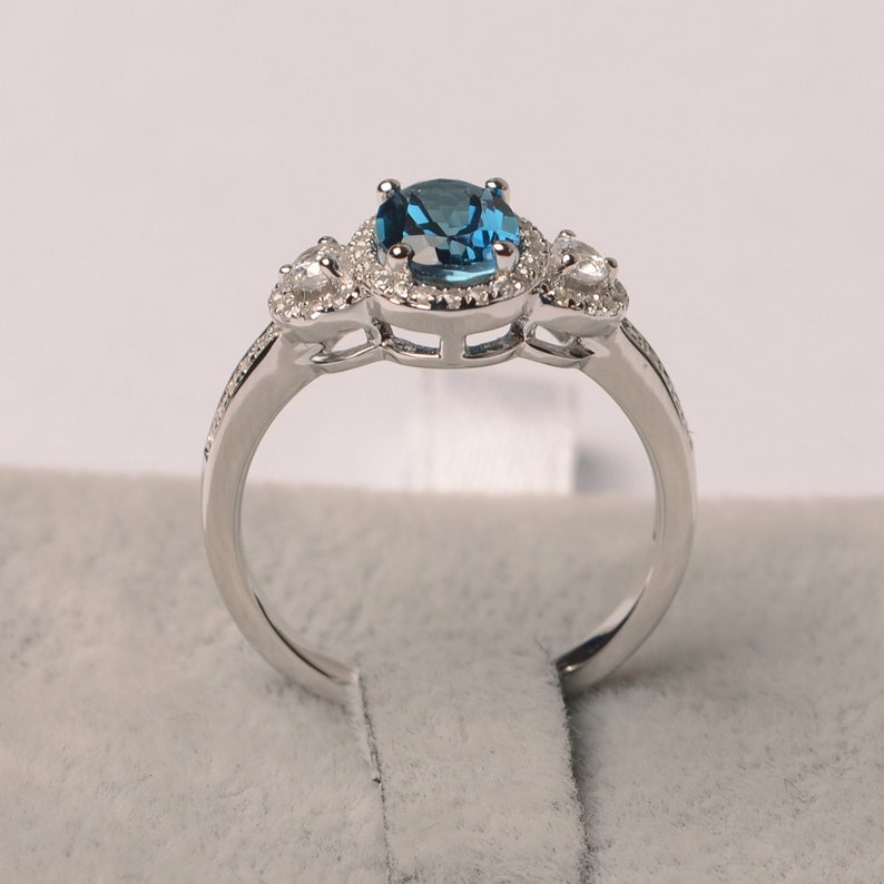 London blue topaz ring oval cut halo engagement ring