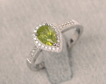 peridot ring gold pear shape halo ring promising ring for women