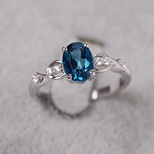 London blue topaz ring oval cut white gold engagement ring for women