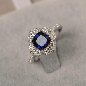 Blue sapphire ring cushion cut September birthstone ring white gold flower halo engagement ring for women