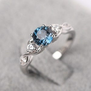 Delicate London Blue Topaz Infinity Engagement Ring Sterling Silver ...