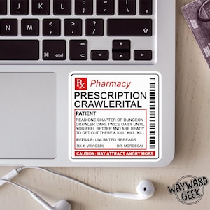 May include: A white sticker with the text "Pharmacy PRESCRIPTION CRAWLERITAL" in black and red. The sticker includes instructions for the patient and a warning about attracting angry mobs. The sticker is on a laptop.
