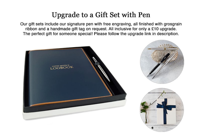 May include: A navy blue leather-bound journal with a tan leather trim and gold lettering that reads "Gypsy Moth II Logbook". The journal is in a white gift box with a silver pen. The image also shows a close-up of the pen and a gift box wrapped in white paper with a navy blue ribbon.