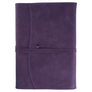 May include: A purple leather journal with a tied closure. The journal has a textured surface and a simple design.