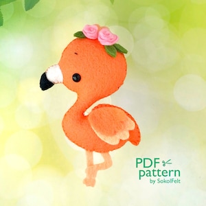 May include: A felt flamingo with a pink flower crown. The flamingo is orange with a white belly and a black beak. The flower crown has two pink flowers and green leaves. The text "PDF pattern by SokolFelt" is in the bottom right corner of the image.