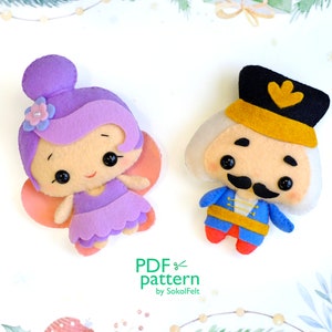 Könnte beinhalten: Ein Filz-Bastelmuster für eine lila Fee und einen Nussknacker. Das Muster enthält Anweisungen zum Nähen der Figuren. Das Muster heißt "PDF Pattern by SokolFelt".