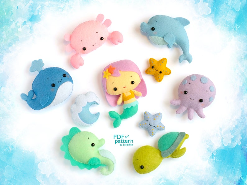 May include: A set of felt ocean animal patterns for sewing. The patterns include a whale, dolphin, crab, mermaid, octopus, seahorse, turtle, and two starfish.
