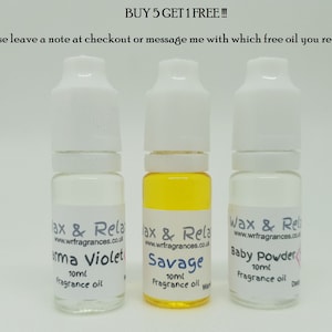 May include: Three small glass bottles with white caps and labels. The labels are white with black text and say "Wax & Relax" and the name of the fragrance. The fragrances are "Baby Powder", "Savage", and "Aroma Violet". Each bottle contains 10 ml of fragrance oil.