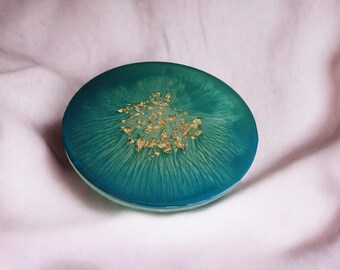 Unique resin turquoise tray with gold legs and embedded gold leaves