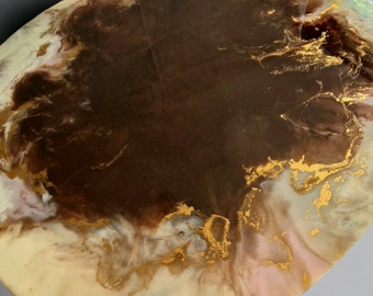 Resin colored coffee table in brown, marble like table, metal legs