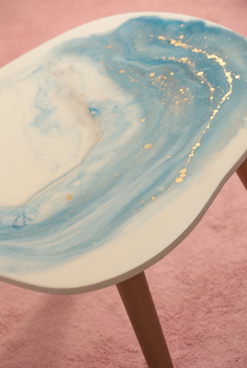 Resin colored coffee table in blue and white, marble like table, wooden legs image 1