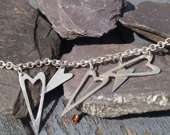 Silver Hearts Bracelet With Large Heart Charms.