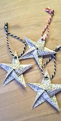 Book folding art: Stars made from old books or music sheets, hand-folded and provided with an eyelet for hanging