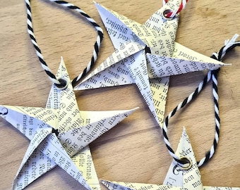 Book folding art: Stars made from old books or music sheets, hand-folded and provided with an eyelet for hanging