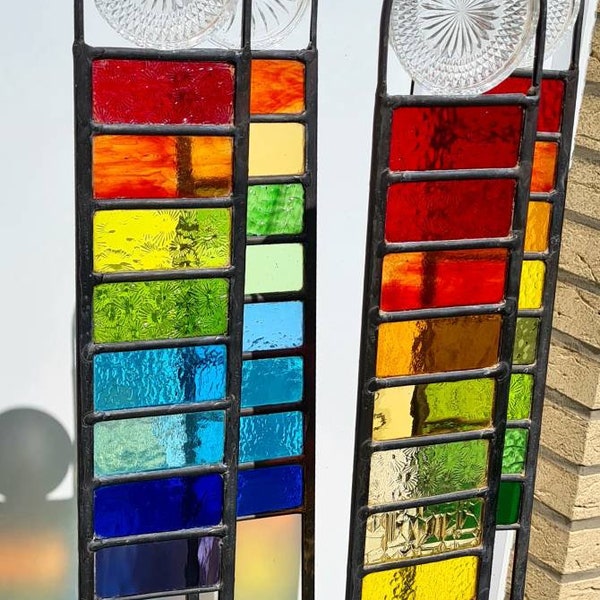 Garden steles made of stained glass in lead glazing with vintage element (old glass coaster) beautiful light reflections