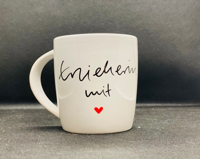 Cup educator with heart