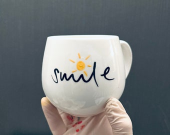 Tasse mit Smile und Sonne